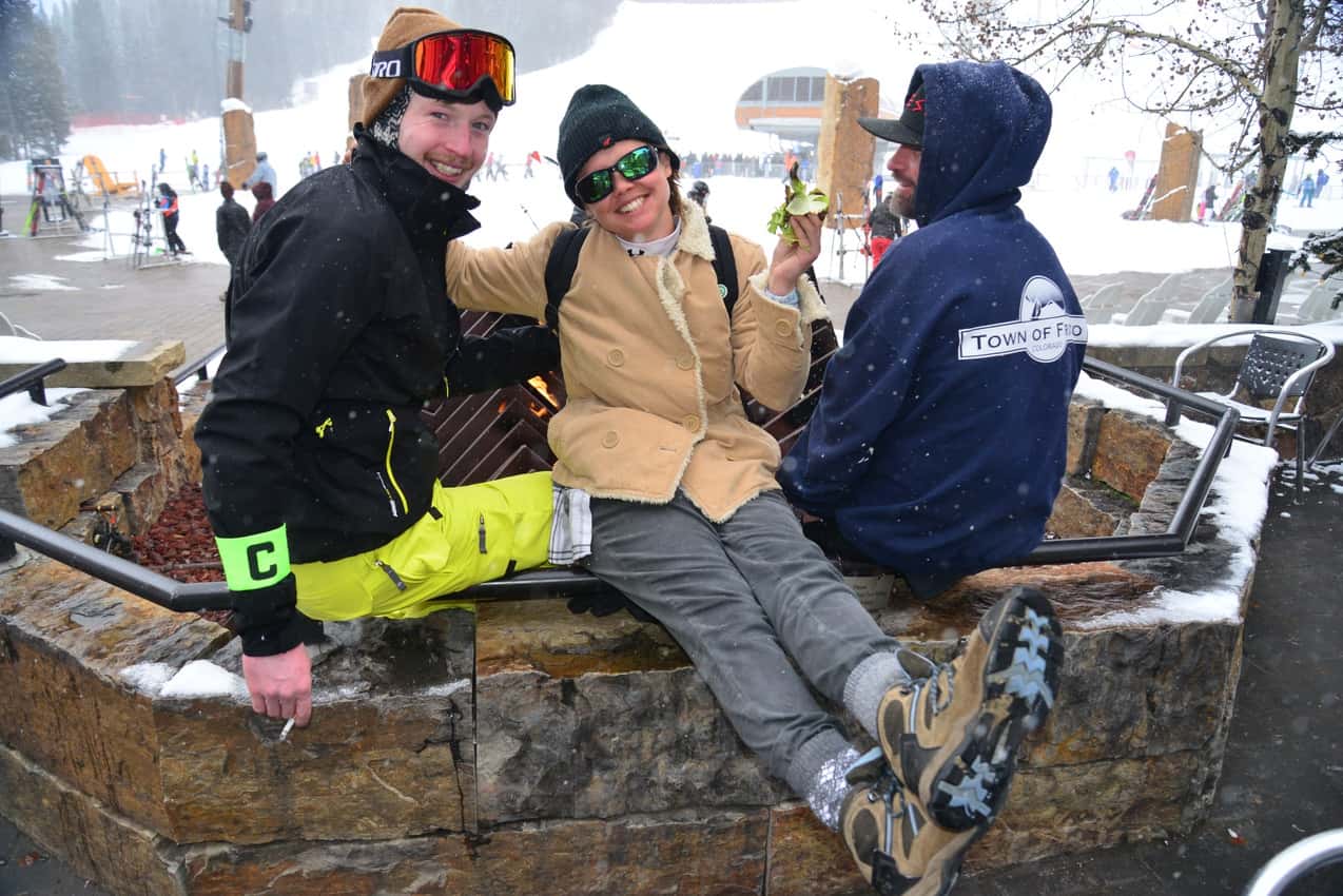 Hannah Milks and her buddies warm up around an opulent outdoor gas fireplace. 