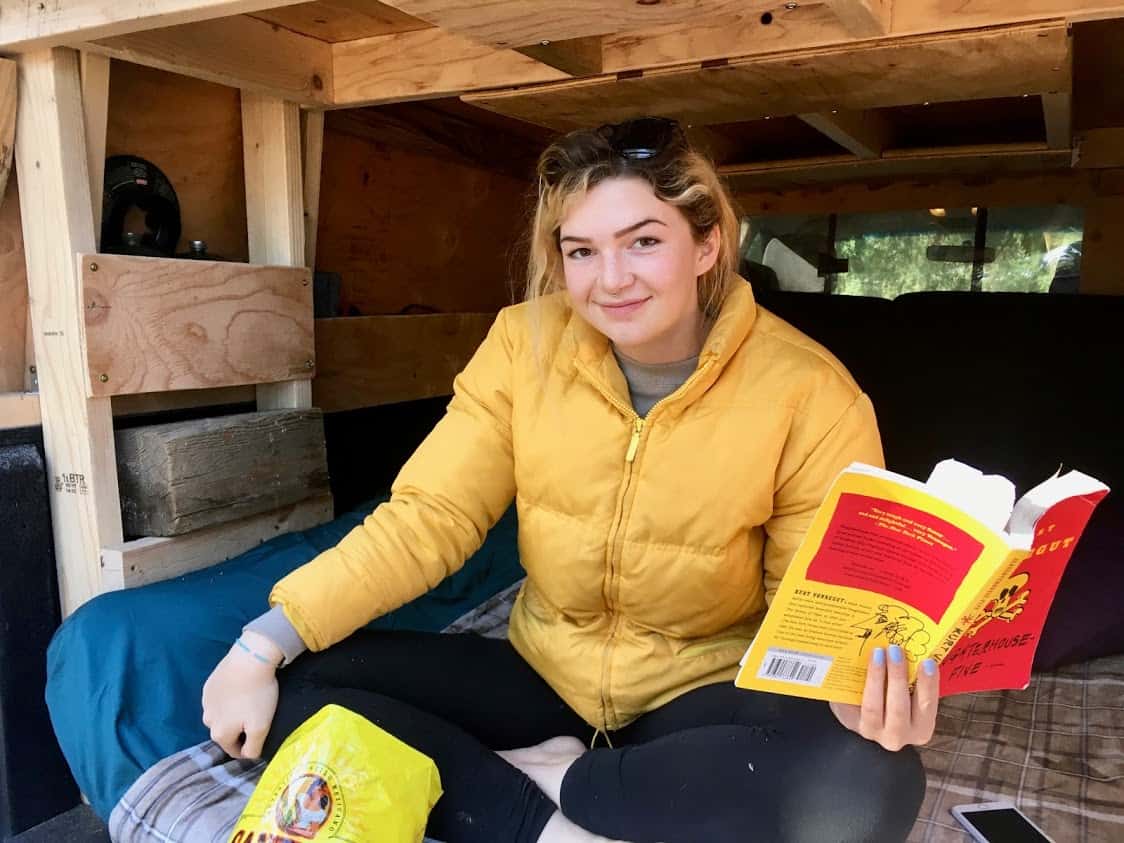 Josie inside Pepper's custom camper shell.