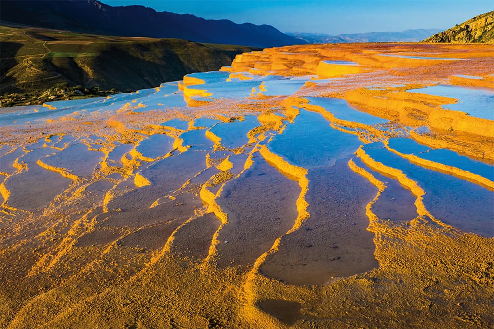 Morning glow at the limestone terraces of Badab-e Surt in northeastern Iran. 