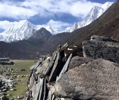 Mani walls in Dharmasala with Manaslu, Naike, and Larke Peak on the backdrop