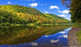 Pow Wow Hill in Pennsylvania eventually rises over 600 feet in a series of steep ledges above the Delaware River.