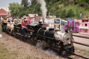 Tiny Town just outside out Denver is a miniature village with full operating steam locomotives that circle the dozens of little houses of this tiny village on a mile long track. Rich Grant photos.