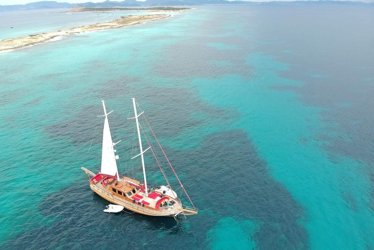 An aerial view of our boat off the shores of Formentera - an island located just off the shores of Ibiza watersports