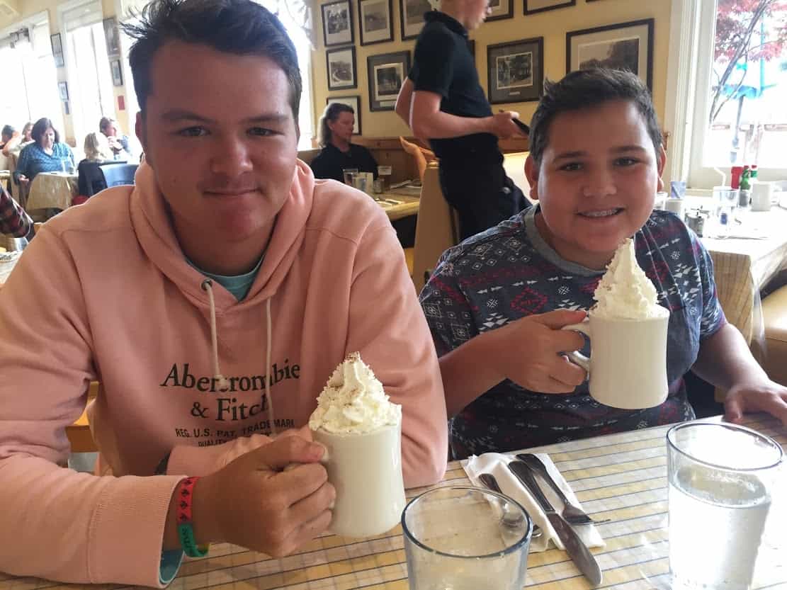 Hiva and Kaui drinking hot chocolate at the Dipsea Cafe in Mill Valley California.