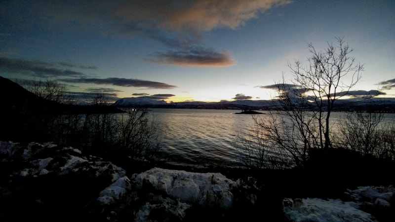 Playful light of the Polar Night along the fjords while road-tripping the islands of lapland, Arctic Norway. Photos Christopher Ludgate