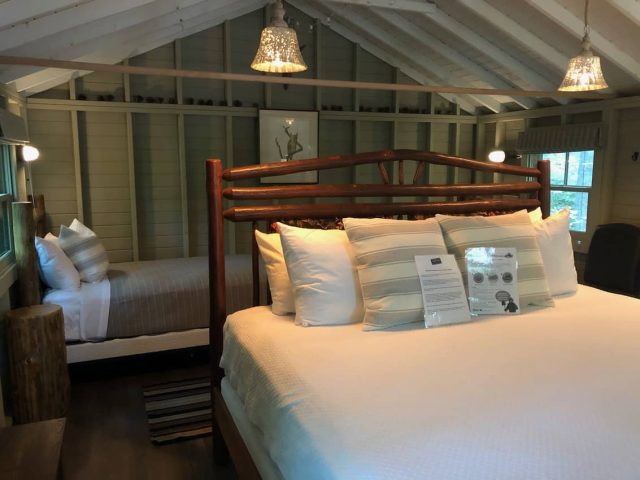 Beds Slipping this single bed behind the big bed gives the kids a special place to sleep. Sandy Pines Camping