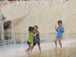 Kids having fun in a park in Medellin, Colombia. photo by William Karz.
