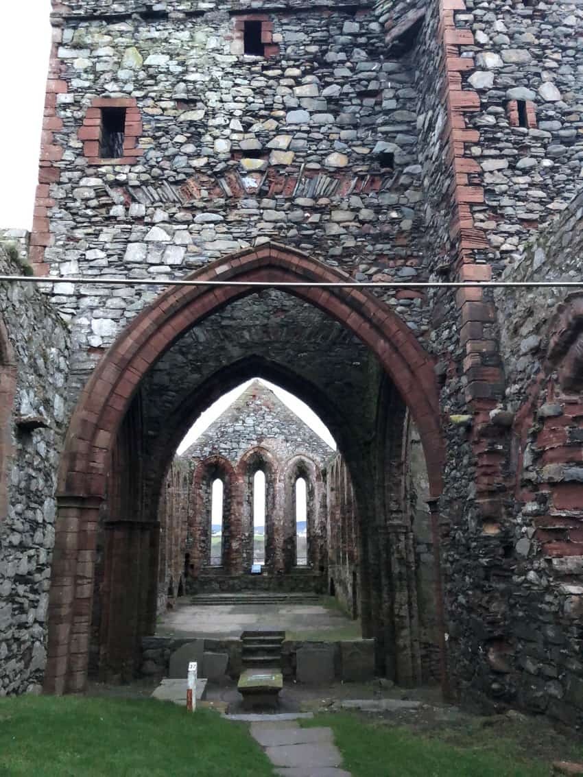 Inside Peel Castle, with beautiful views of the harbor and a beach.