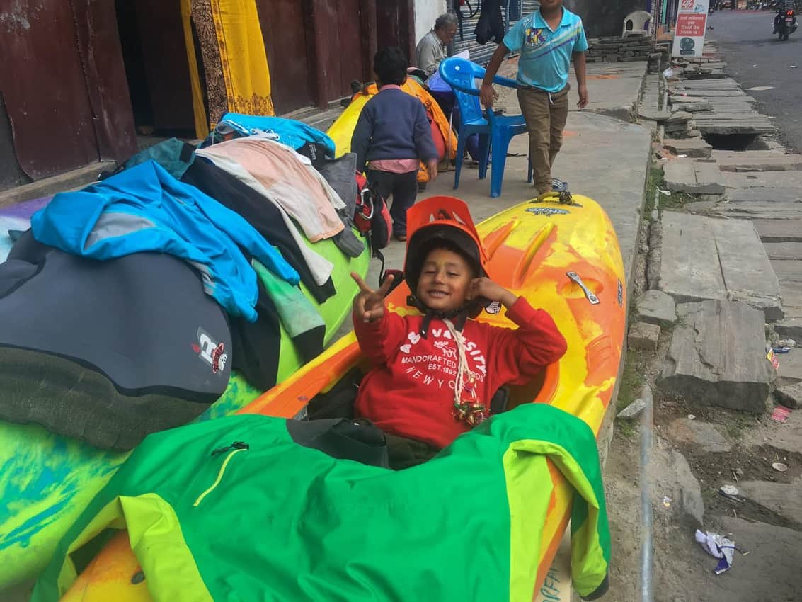 Vimson's son enjoying the colourful paddling kit in Bharabise. Glenn Richards photo.