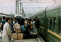 Adventurous New Ways to Travel by Rail 3 Locals and tourists boarding the Trans Siberian Railway.