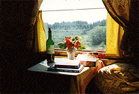 Adventurous New Ways to Travel by Rail 2 A picturesque view from a train cabin window.
