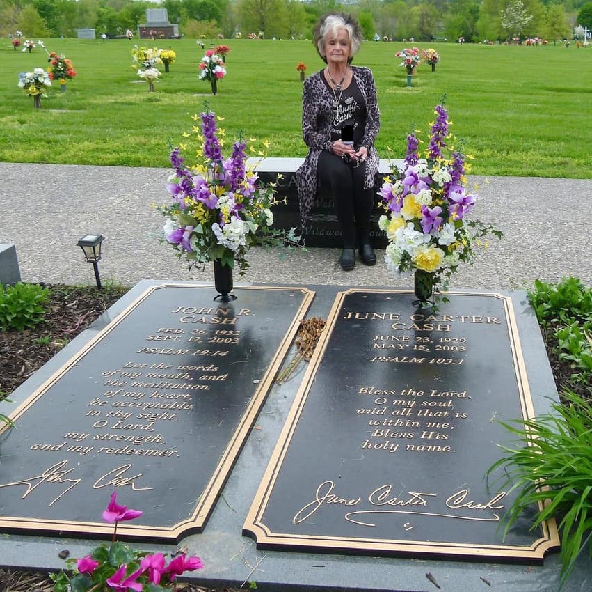 Johnny Cash's sister Joanne Cash Yates at his grave.