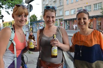 Munich girls with big beers on the street, avoid carrying cash when out and about.. Sonja Stark photos.