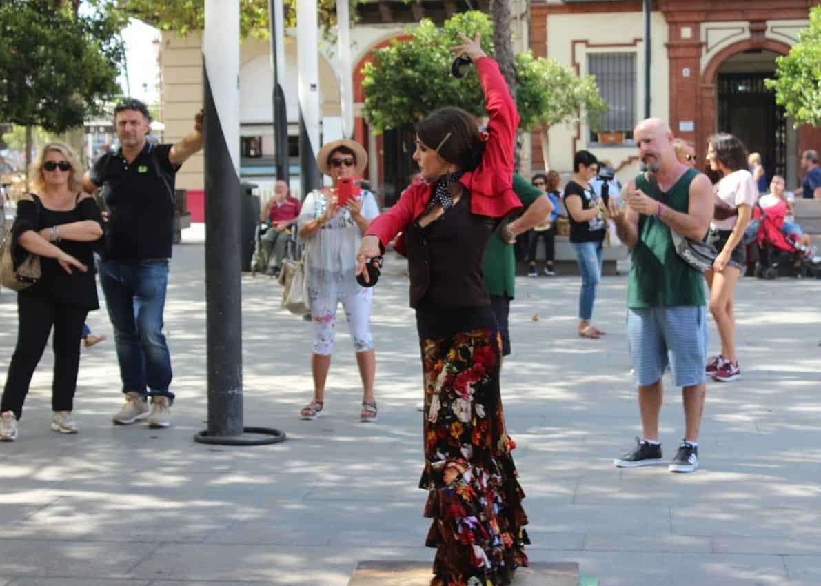 A lady dancing the traditional ‘Sevillana’ dance of the city