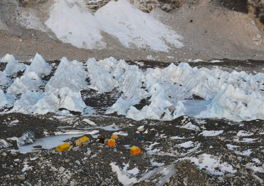 Base camp two. They are preparing for the next migration of trekkers. After public pressure, the piles of rubbish in both base camps have been removed. New legislation should keep them clean.