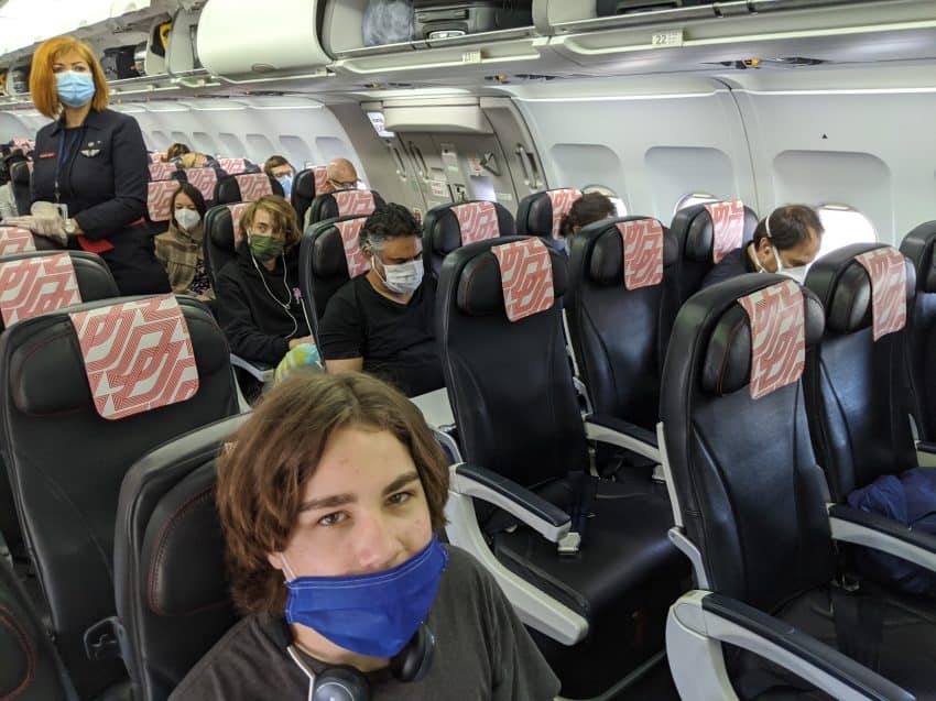 Empty seats, packaged snacks, a changed flying world.