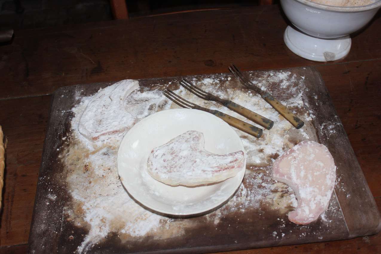 Pork chops and other meats were sometimes coated with flour, prior to cooking. (mock-up was displayed in the kitchen)