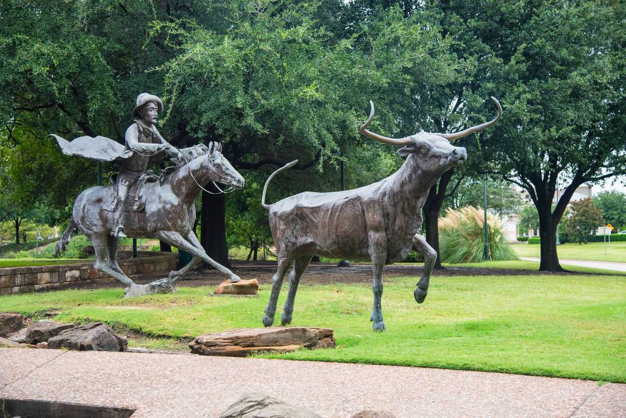 Bronze sculptures are seen in city parks to recall Frisco’s cowtown history. by Fred Mays