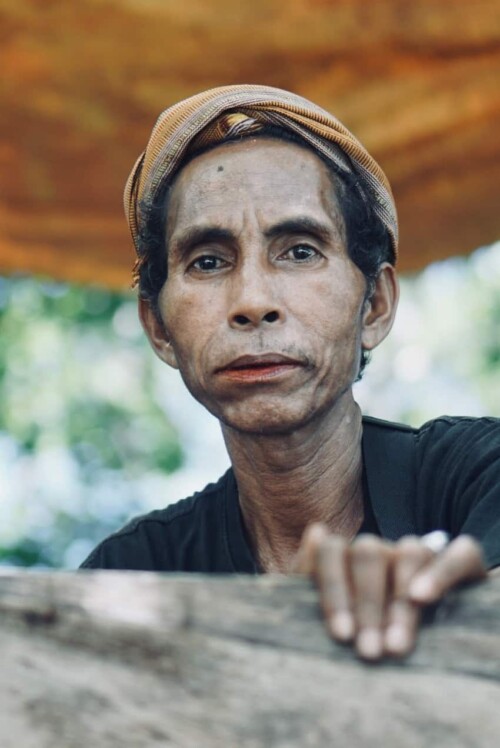 man in Weekuri Lagoon man in Weekuri Lagoon
