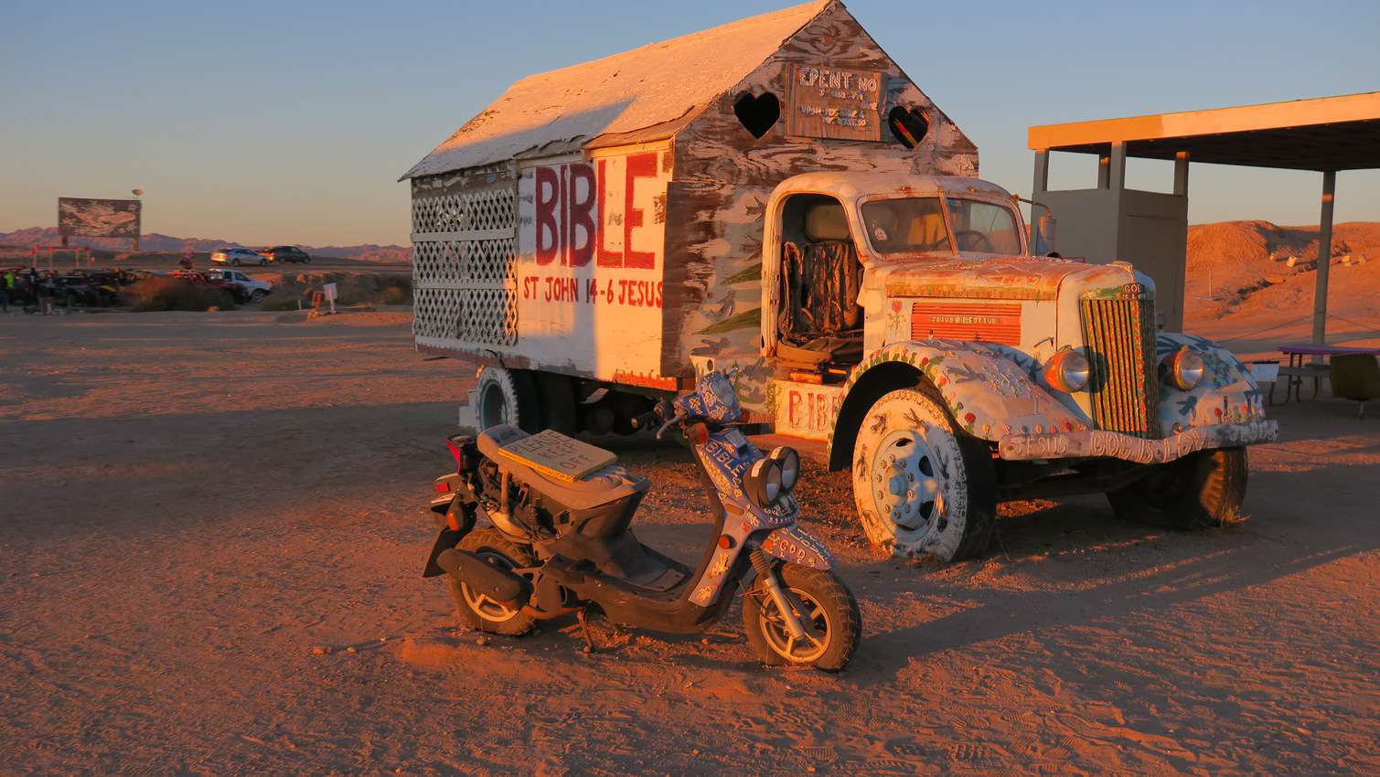 Old truck and a moped at Slab City, Calfornia.