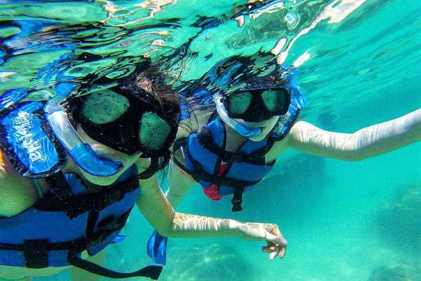 Snorkeling with Friends in the Waters of Xel Há