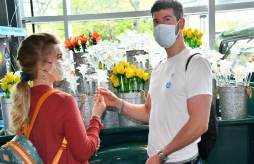 Corning couple with flowers 