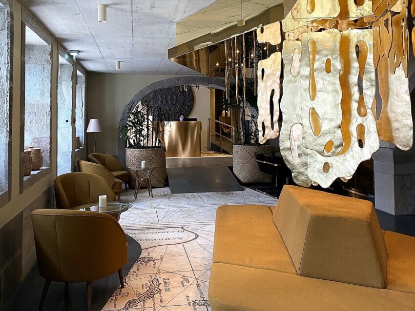 Zenite Boutique Hotel & SPA is the newest and nicest 4-star hotel in Angra do Heroísmo. The gold-themed art instillations remind visitors of the gold, silver, and spice trade that moved through the Azores Islands in the Atlantic.