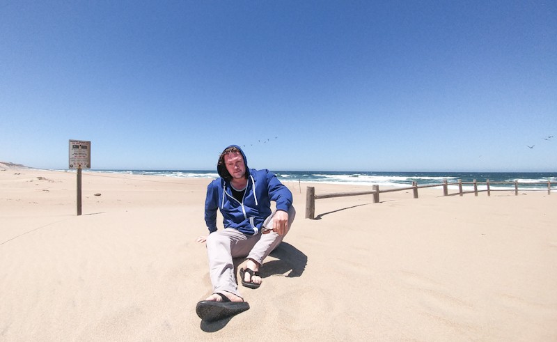 The author at the coastal dunes on a remote escape into an otherworldly environment.