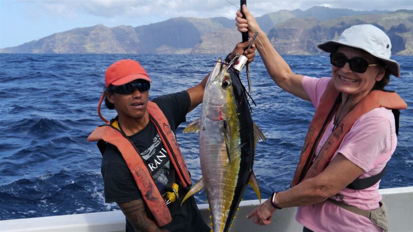 My wife Rosemary, assisted by Antoine, the local fishing expert, caught a 25 kg yellowfin tuna. Marquesas