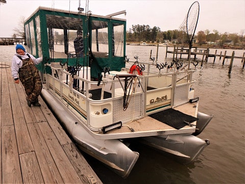 In addition to guiding fishing tours, Mouse makes custom enclosures for pontoon boats...a Mouse House! Photo courtesy of Discover South Carolina.
