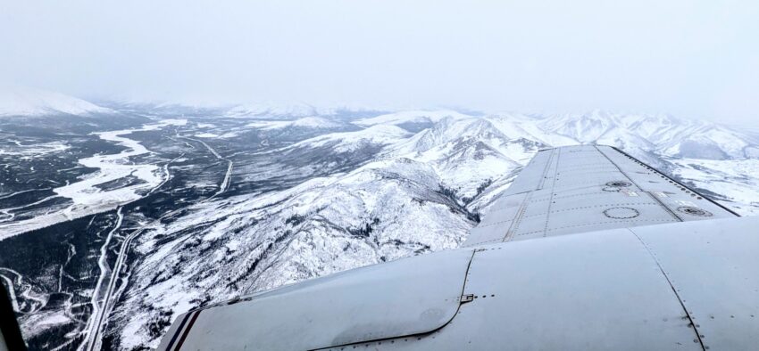 Aerial view of Brooks Mountain range, Alaska Pipeline and Dalton Highway from plane