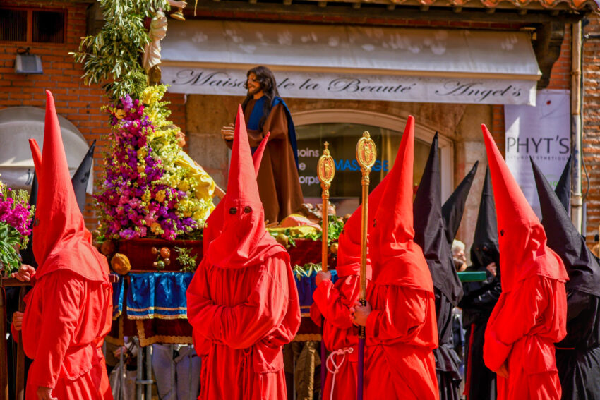 Locals dressed up for La Sanch, penitents that process every year on the Friday before Easter.