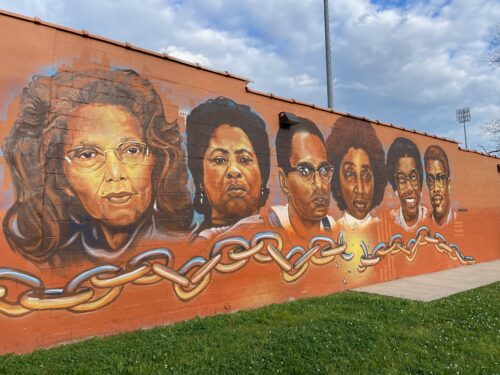 A mural with some of the city's civil rights icons adorns the COPO building in downtown Jackson.