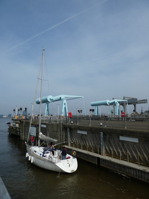 A boat passing through the barrage at Cardiff bay