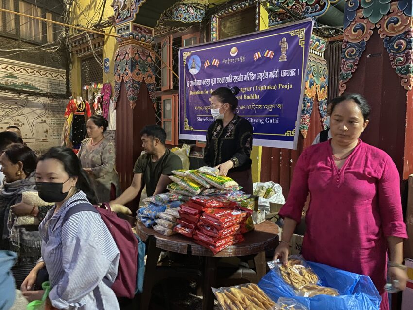 A stand behind the aarati tent at the Boudhanath Stupa sold packs of local food for the ceremony.