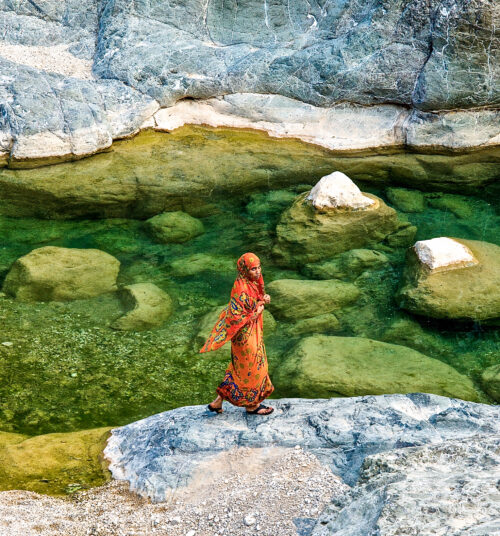 Girl looks on suspiciously, Wadi Tiwi, Oman