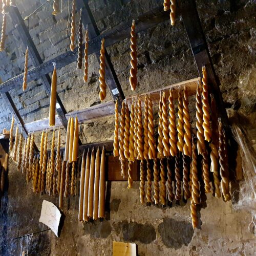 Wax candles curing.