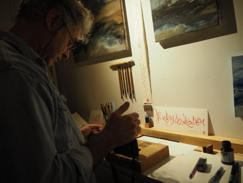 Painter/calligrapher Luc Lynski opens his studio for visitors during the Montmartre Aux artistes open day in October 
