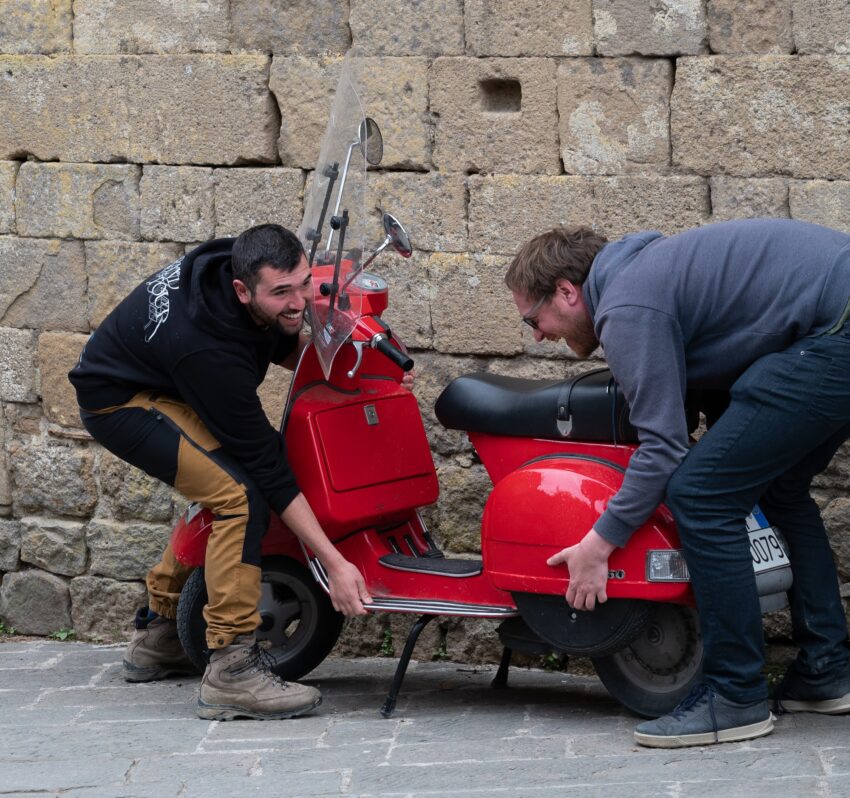 Info Our fearless leaders Bruno (left) and Albert did their best to try and move this scooter into the middle of the street for a better shot, but weren't successful.