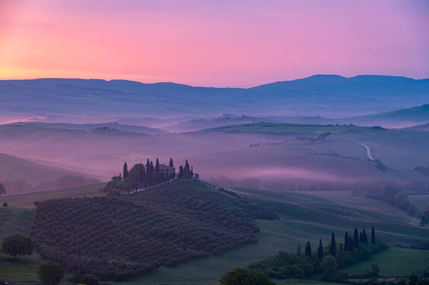 The element of fog at sunrise added a mystical vibe to my images. Tuscany. Donnie Sexton photos.