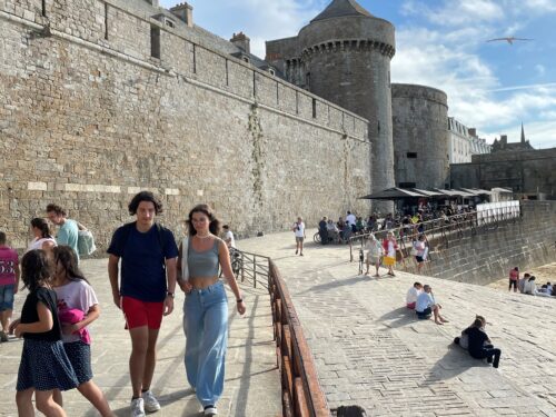 At low tide, the walls of Saint-Malo are drydocked by a sea of rocks. You can walk the walls of Saint-Malo, which are about a mile long on the ramparts, with an amazing town of twisting cobblestone streets and cafes inside in the old town.