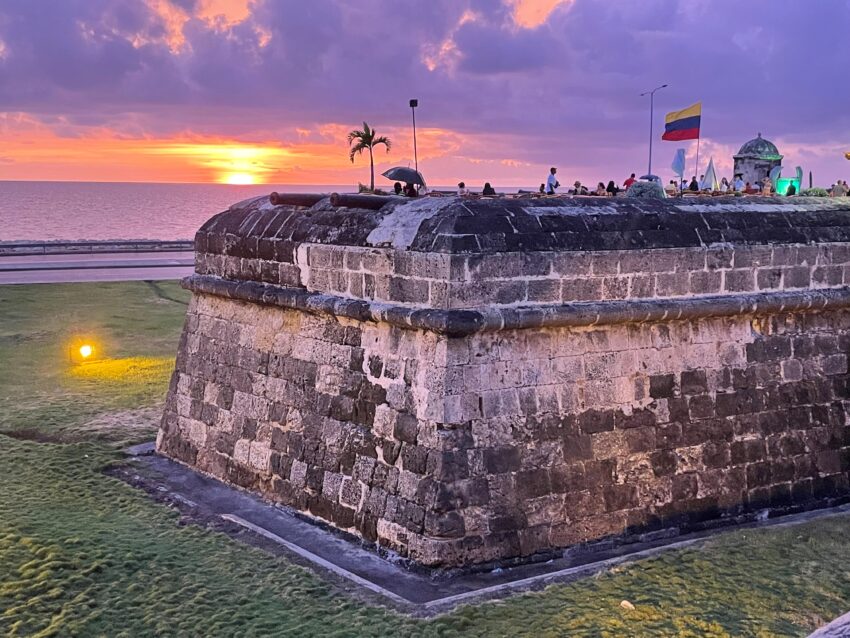 The walls of Cartagena are lined with cannons and bars.