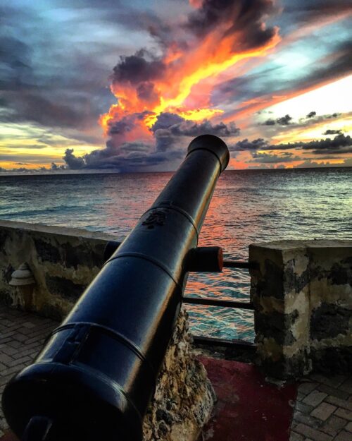 One of the guns at old Fort Charlotte in Barbados, which now guards the swimming pool at the Hilton Barbados Resort and is the perfect place for sunsets.