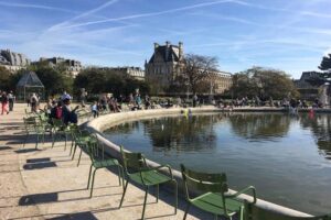 Classic green chairs invite you to admire the view at the Tuileries.