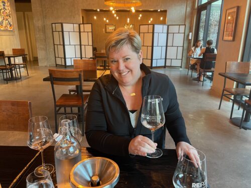 Jen Beckmann is a sommelier who offers wine that comes in refillable bottles out of kegs at ReRooted at Hemisfair in San Antonio.