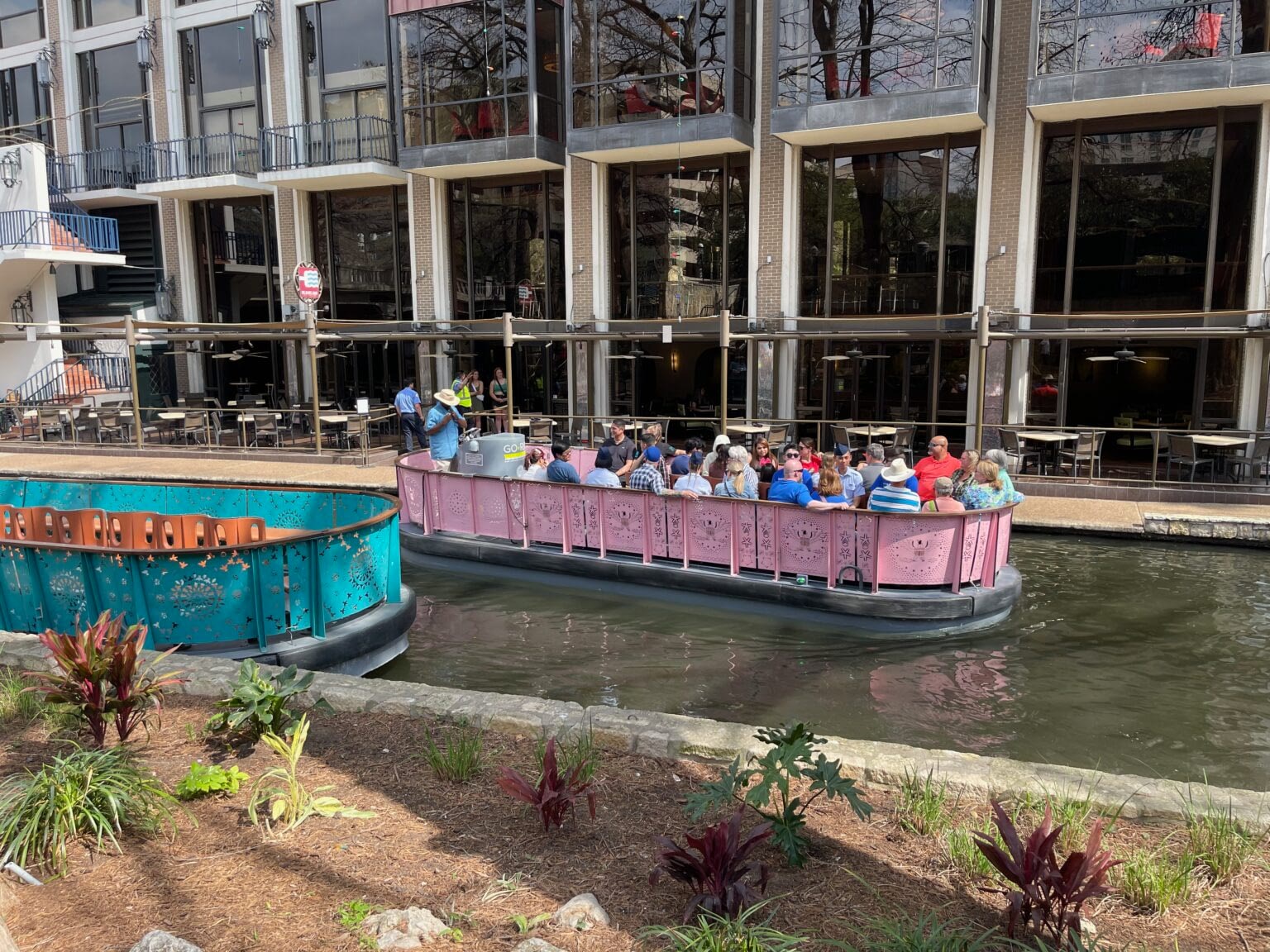 GO RIO river walk boat tour on the San Antonio river.