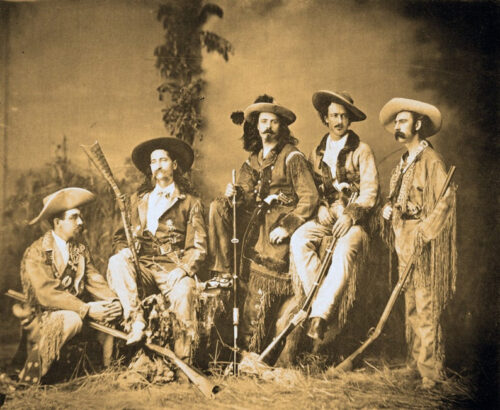 Wild Bill (second from left) and Buffalo Bill Cody (third from left) in their New York Show publicity photo.