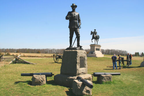 Generals Buford foreground Reynolds on horse on the Chambersburg Pike