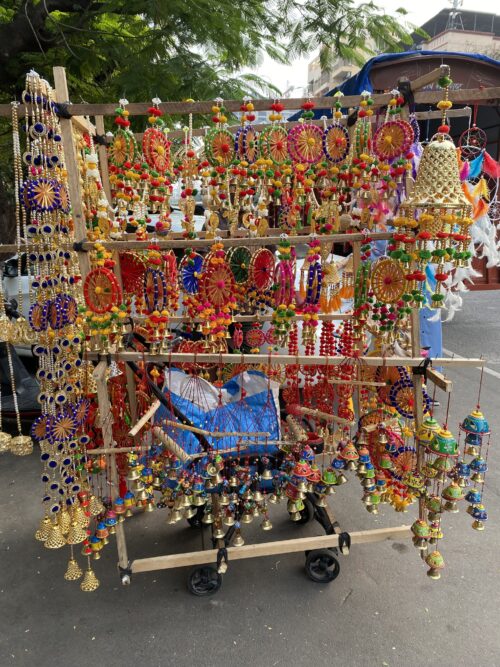 Trinkets and decorative items for sale by itinerant vendor on wheels