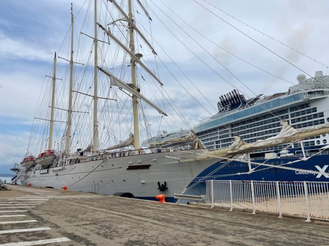 Next to the Celebrity Edge The Star Clipper next to the huge Celebrity Edge in Corsica.